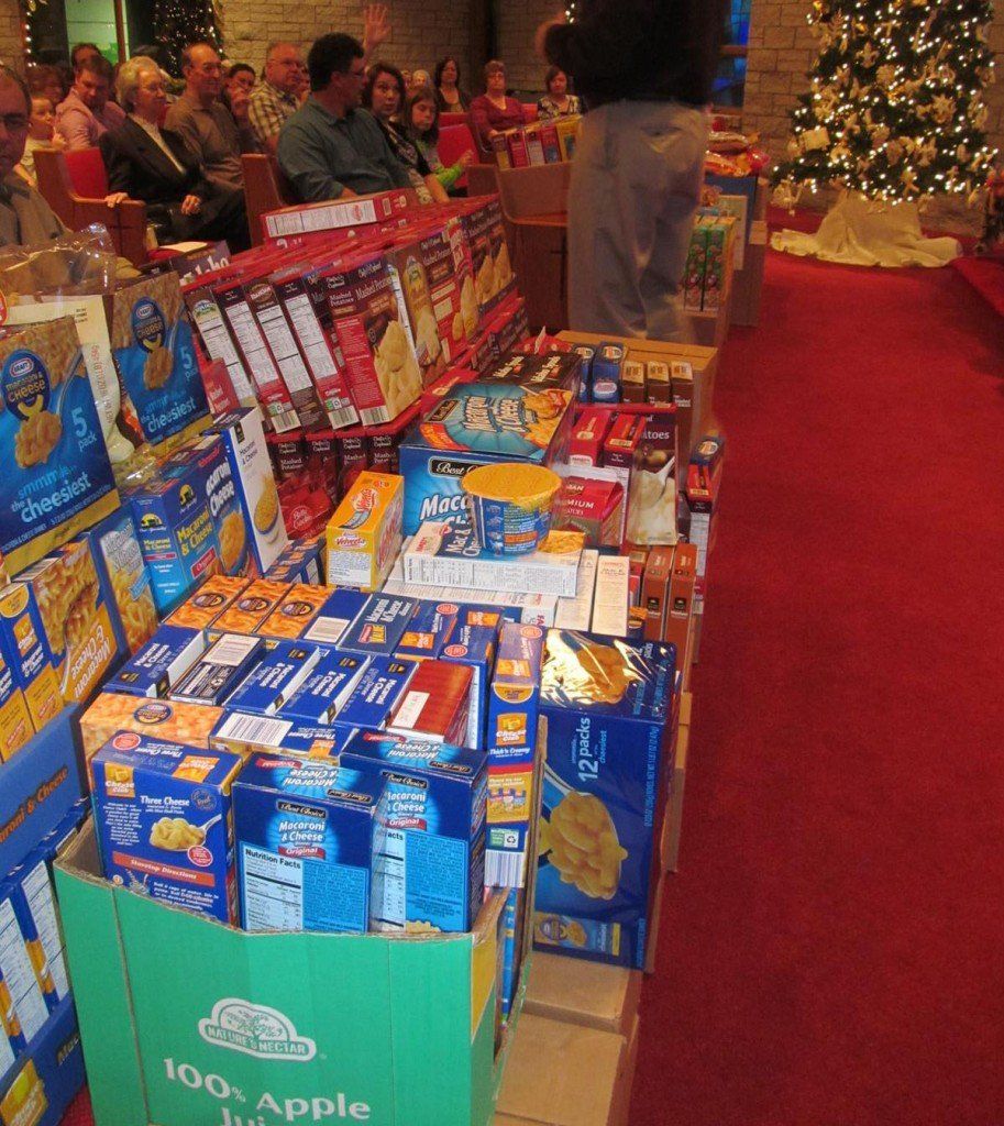 Items overflow the front pews of the Gillespie Methodist Church.