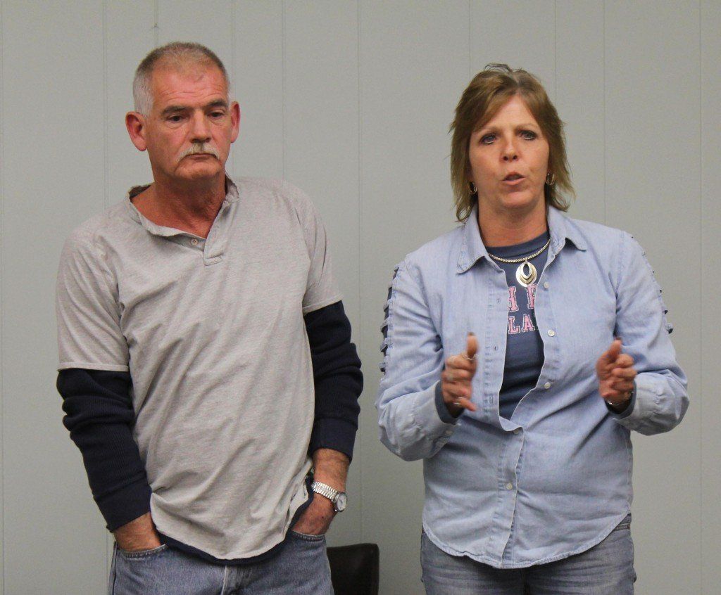 Michael Busby and Jill Baumer question the council if the city has an easement on their property to cover the water meter.