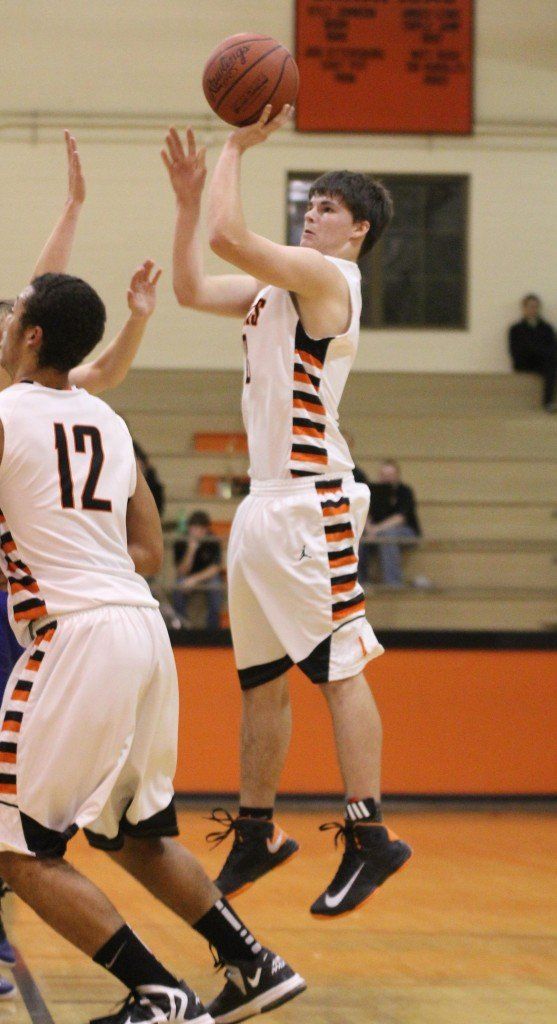 Michael Henderson knocks down a jump shot in the Miners loss to Greenville Friday evening. The boys lost 59-50 in overtime. 