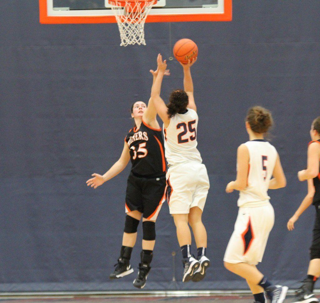 Haylie Kirkwood attempts to block the shot in the Lady Miners loss to Pana yesterday afternoon. The Miners came up short 33-52.