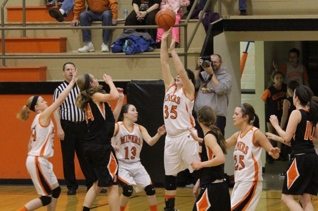 Haylie Kirkwood deflects a pass as the rest of the team play a tough man-to-man defense. 