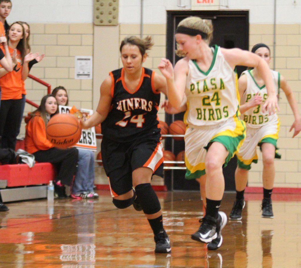 Chelsea Gill dribbles the ball down the court in the Lady Miners' loss to Southwestern yesterday. 