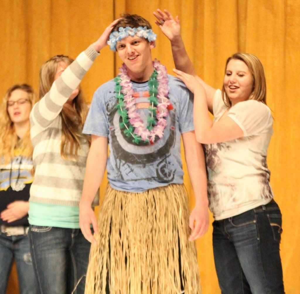 Nate Henrichs, Darian Gill, and Emily Harszy practice their roles in South Pacific. The play, performed by the Gillespie High School choir, will open this Thursday evening. Tickets can be purchased at Dee-Dee's in Gillespie.