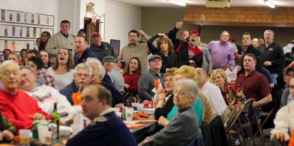 Supporters cheer on their respected mice during the All-Weather Track Committee's annual fundraiser. The Mouse Races raised over $4,000, read more on the event.