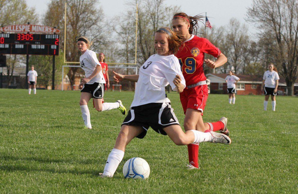 Tyler Ross shoots for the goal in the girls' soccer game versus Roxana this week. The ladies came up short, 0-2. 