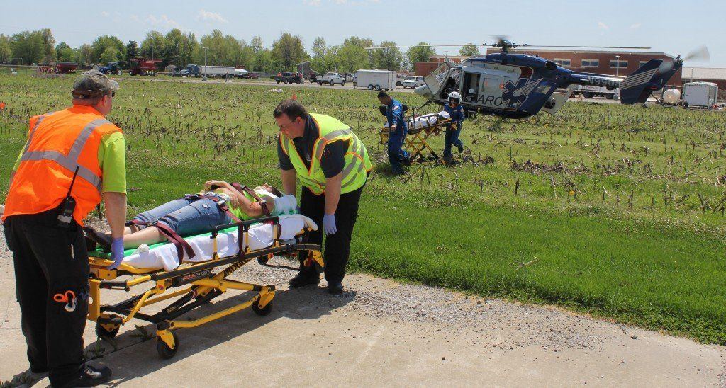 During MPACT'D Rally for Road Safety, local medical crews relay a "severely injured" victim to the ARCH Helicopter medical team. Read more about the Rally. 