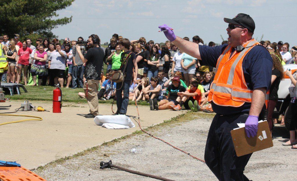 EMT personnel help prepare crews for the arrival of the ARCH Helicopter.
