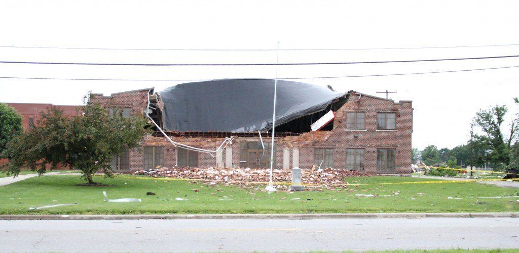 Front of the Gillespie High School gymnasium after winds ripped the roof off the front of the building. 