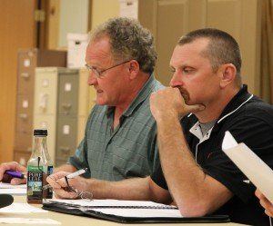 Dave Griffel (left) and Billy Carter (right) vote "no" on hiring Emmons as secondary school principal. Griffel cited he was not comfortable with the plan the administration has.
