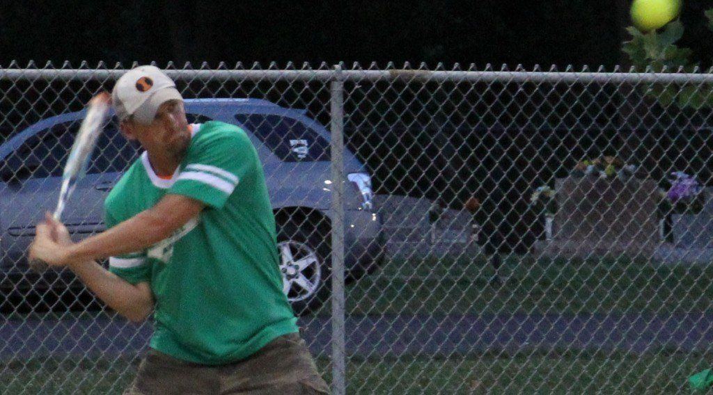 Todd Goldasich takes part in the Norman Poppy Halpin Memorial slowpitch softball tournament and takes a nice knock at this pitch.