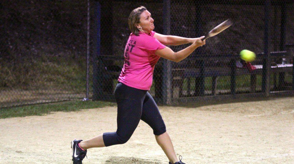 Youngsters and oldsters alike take swings in the slow pitch tournament held by the Benld Fire Department this week. The double elimination tournament continues today. 