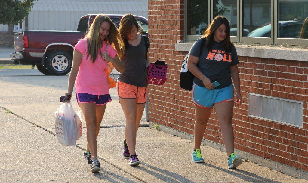 High schoolers head into class on the first day of school last week.