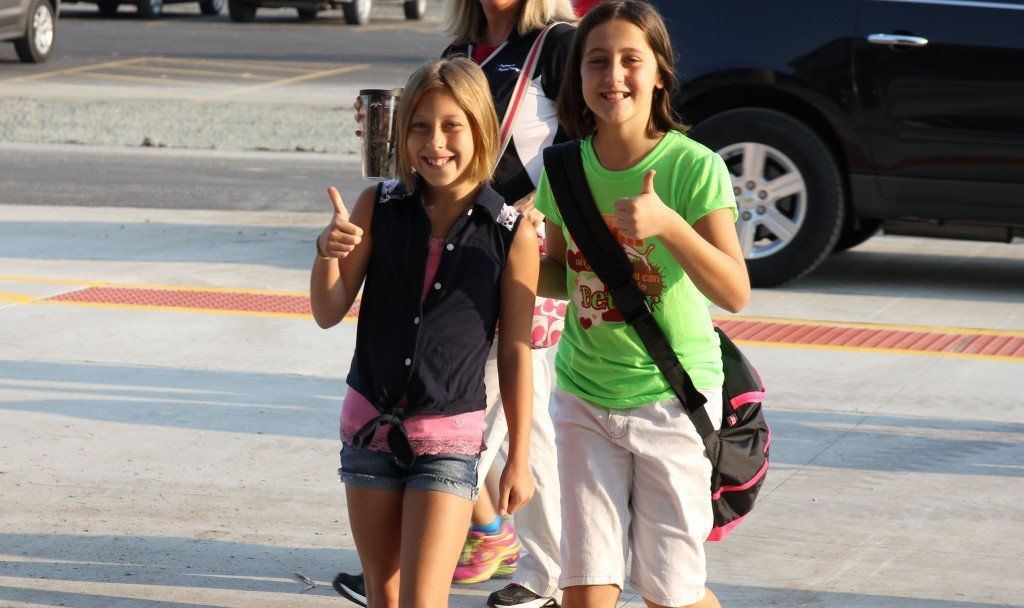 Students flashed us "thumbs up" as they walked into the new Ben-Gil Elementary School.