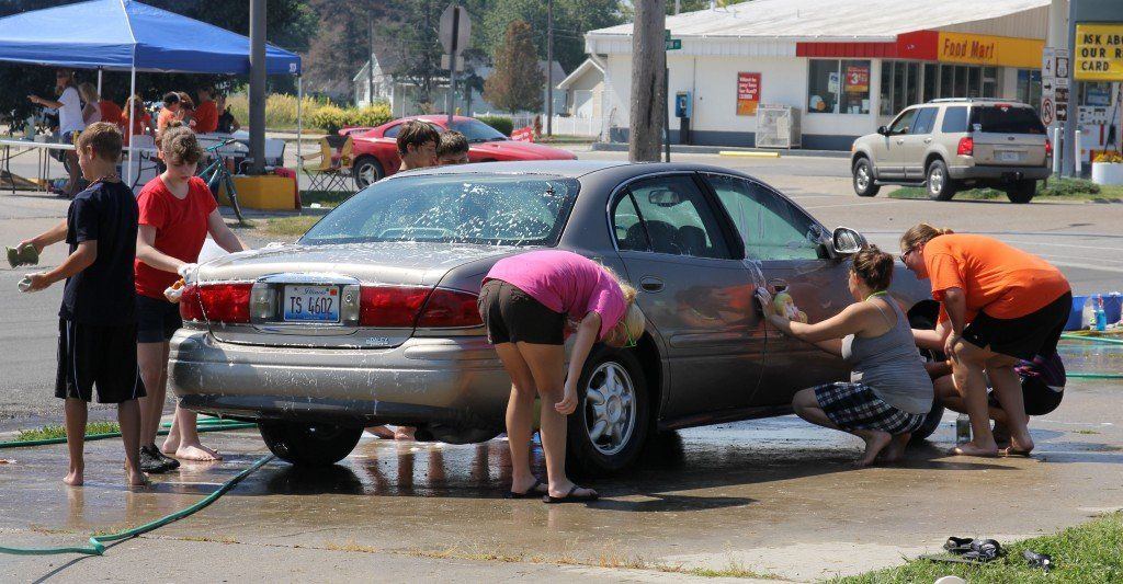 The Gillespie High School choir gathered on Saturday morning to hold a cookout and car wash. The annual fundraiser was a huge success.