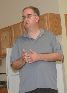 Historian Tom Emery discusses the Carlinville High School fire of 1987 and the process involved with writing a 75-page booklet commemorating it at the Macoupin County Historical Society’s September meeting.