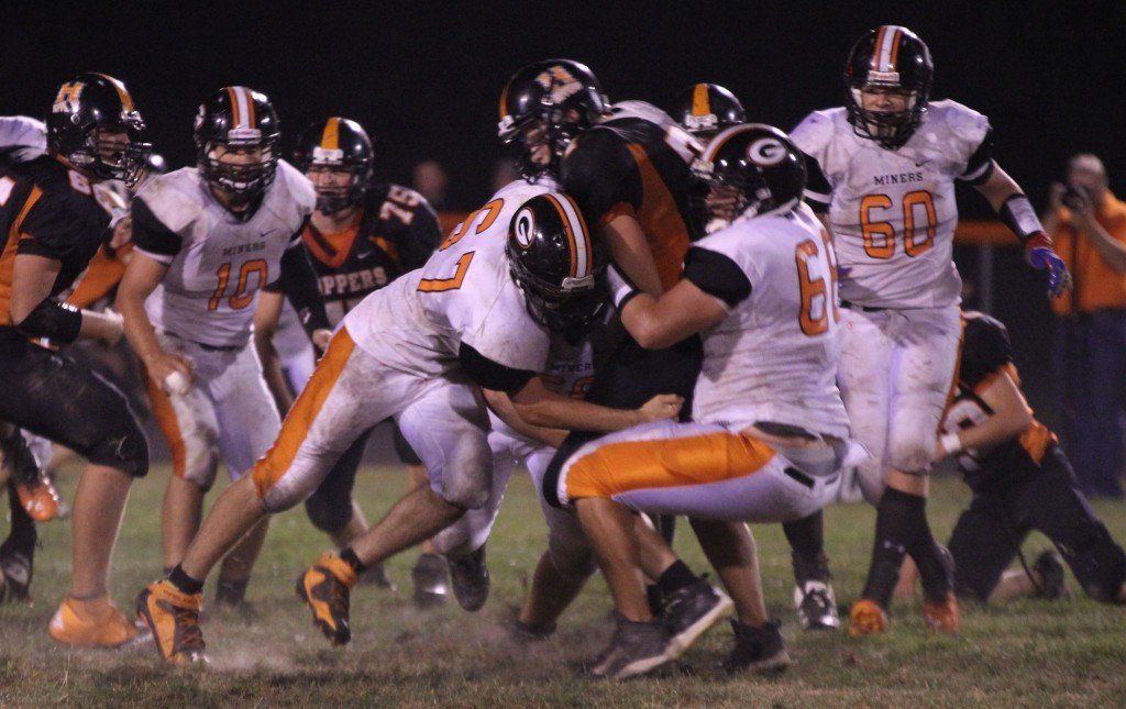 Hunter Vesper, Ian Wilder, and Dustin Byrd take down Hillsboro's quarterback in Gillespie's fifth win of the season. The Miners are now 5-0 on the season.
