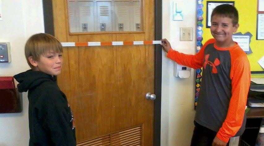 6th grade math students Aidan Libbra and Billy Gill are learning to use the metric measurements in 6th grade math.