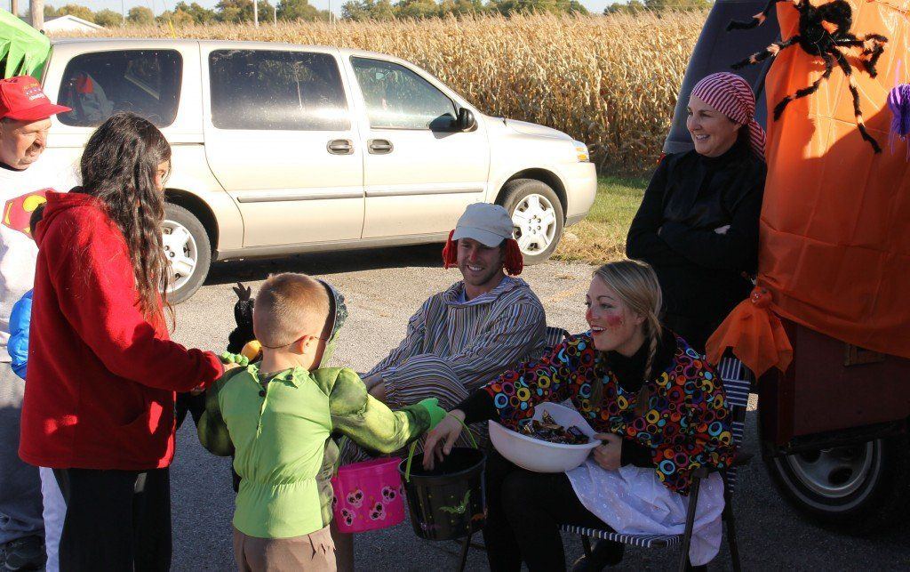 Hundreds of kids and their parents went trunk-or-treating Sunday afternoon at United Methodist Church. The Zehr family, pictured above, dressed as pirates and clowns Sunday.