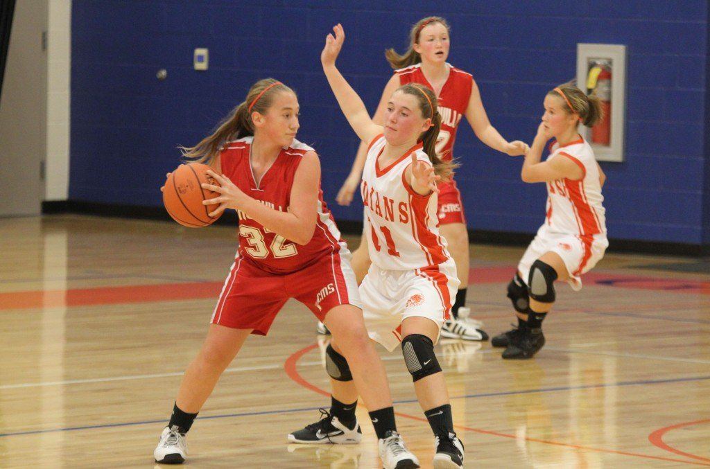 Karli Carr plays tough defense on her opponent while Macie Halpin tries to prevent her opponent from getting a pass. The Indians ended up beating Carlinville. 