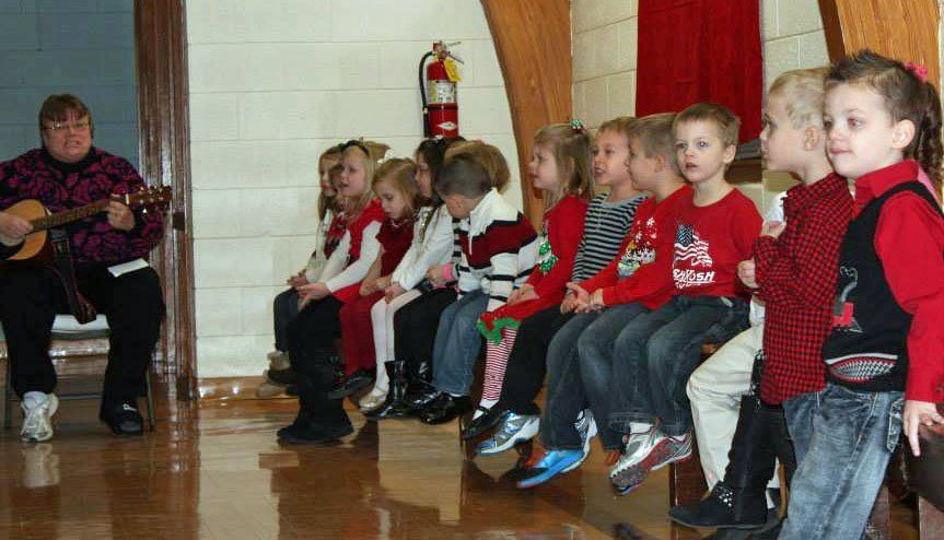 Education Station preschoolers sing with Pastor Chris' tune during their annual Christmas program.  (By Education Station Preschool)