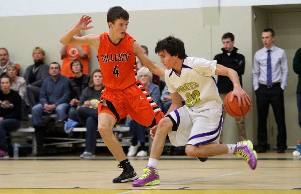 Evan Price keeps up with his opponent in the Metro East Lutheran Turkey Tip-Off. The boys placed sixth.