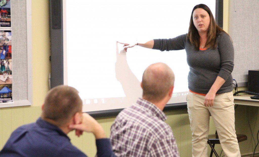 Casey Willman explains Course Mason to the board.