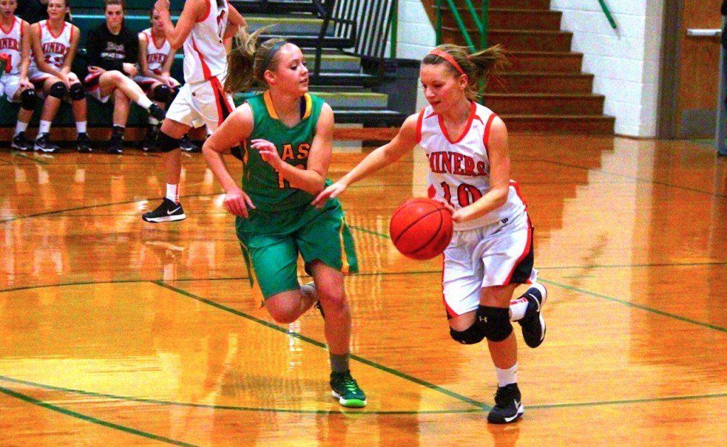 Tyler Ross dribbles down the floor in the Southwestern Tournament. THe girls came up short to Southwestern.