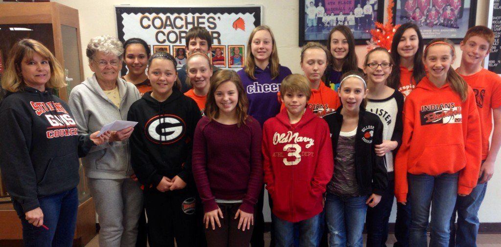 Gillespie Middle School student council sponsored a community fundraiser and collected over $500 through a Penny War this month. The money raised is being donated to Joyful Angels, directed by Dixie Lamparter, who is pictured with the members of the GMS student council.