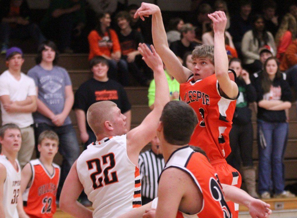 Blake Hayes knocks down a jump shot in the middle of the lane in the boys loss to HIllsboro this week.