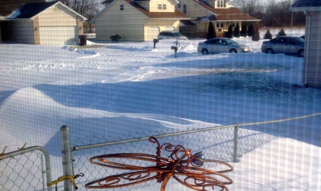 We had one final submission from a reader residing in East Gillespie. Her picture show the snow drift stands almost as high as her chain link fence in her backyard. 