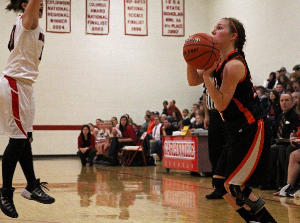 Ellen Gray nails a 3-pointer in the Carlinville Holiday Tourney. 
