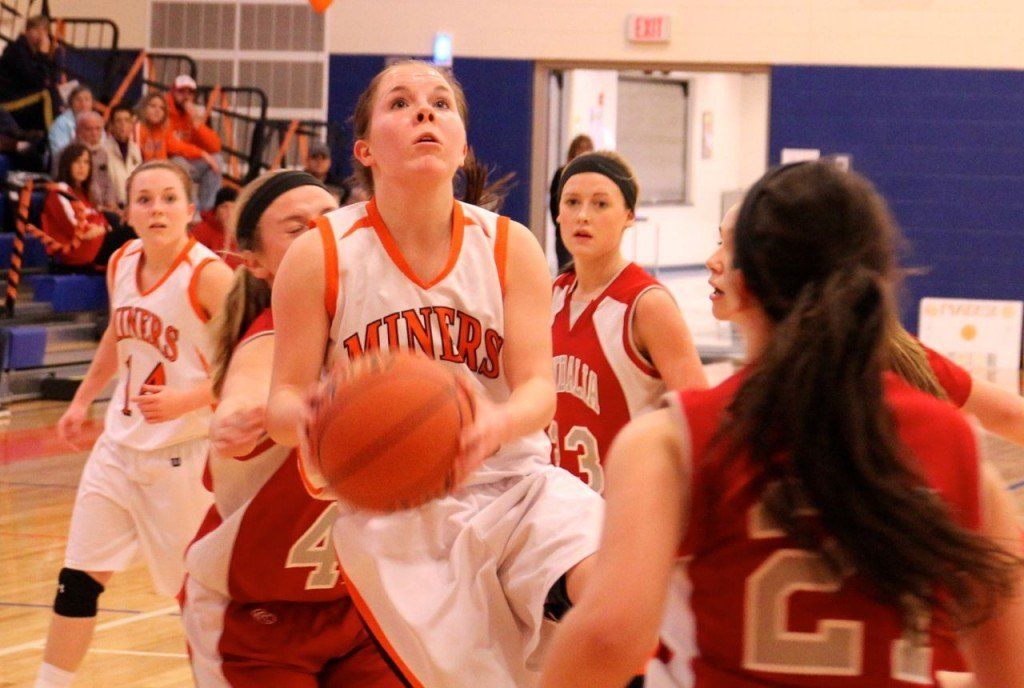 Molly Gray attempts a short range shot on senior night yesterday. 