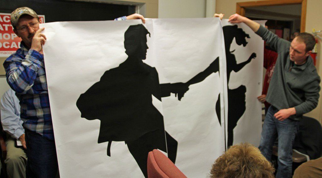 Aldermen Brian Frensko and Peyton Bernot display the size of the dancing sculpture to be installed by Route 66 during Benld's city council meeting last week. Read more about the meeting here. 