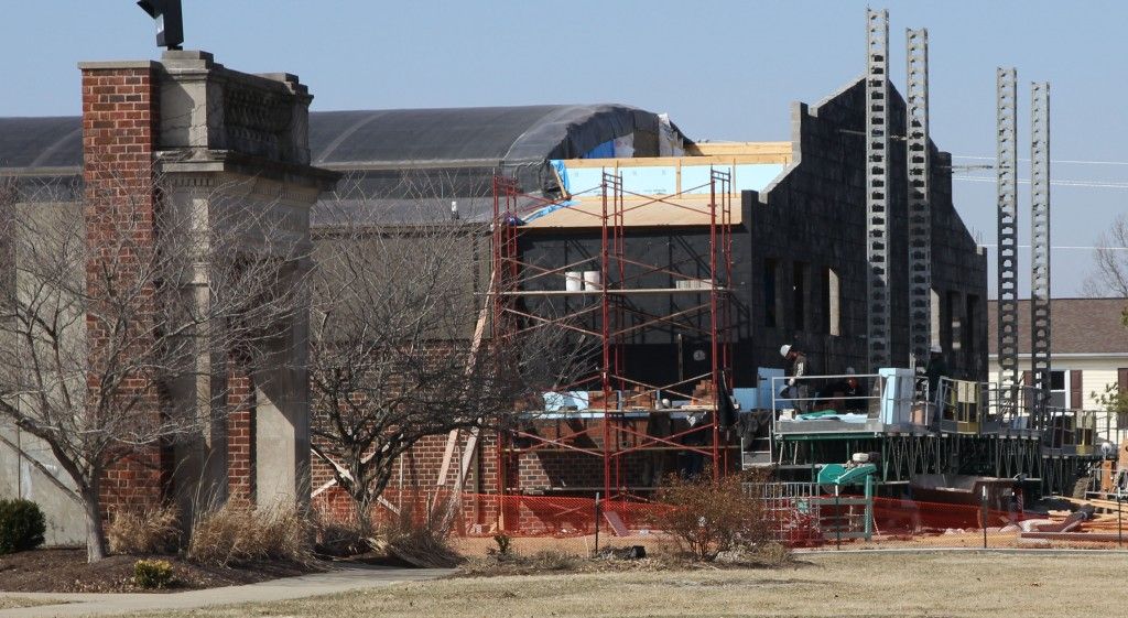 Workers continue working on the front of the Gillespie High School gym. They continued to face the building with brick this week. 