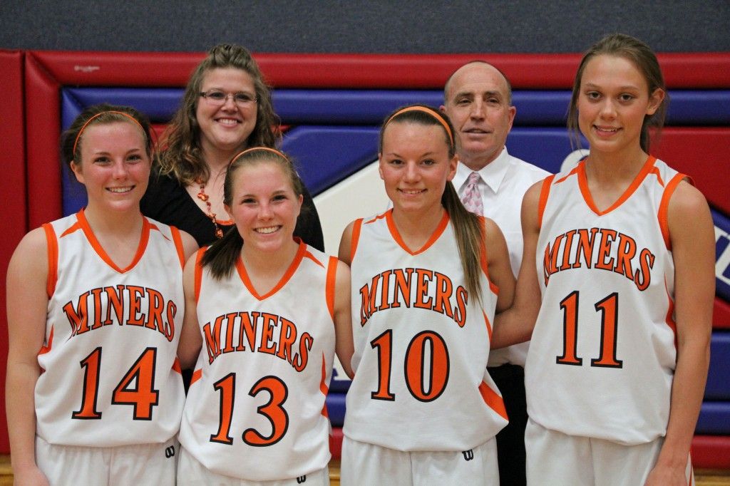 Four Gillespie basketball girls play in the Carlinville Rotary All-Star game last Sunday while coaches Kevin Gray and Christina Blevins coach the West team. Players from L-R: Ellen Gray, Molly Gray, Tyler Ross and Kayli Morris. 