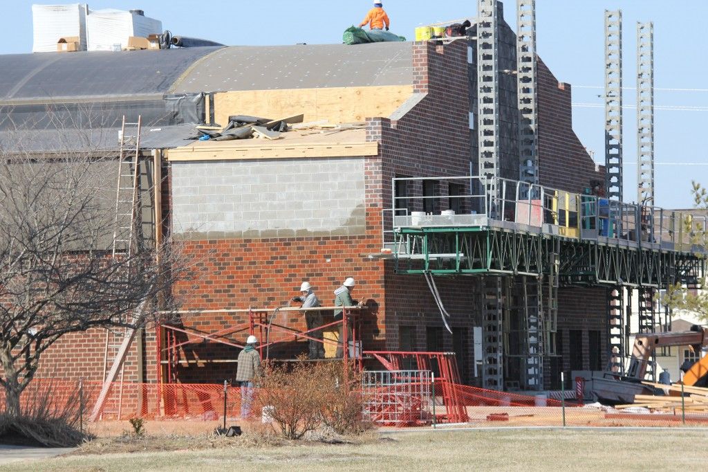 Crews work on the roof and brickwork this week.
