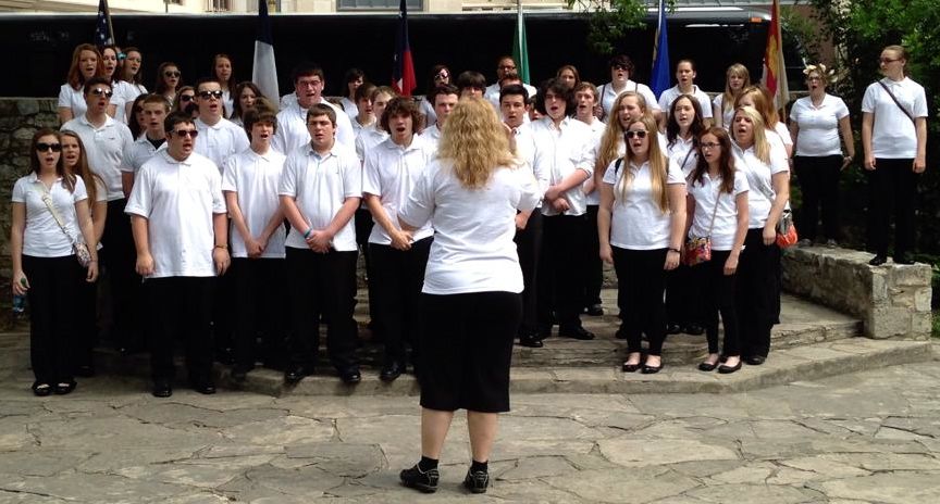 The Gillespie High School choir performs at Calvary Court while on their San Antonio trip.