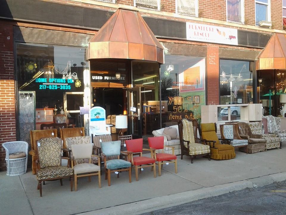 Furniture Rescue lines their sidewalk with furniture 50% off for the CCCC's Community-Wide Yard Sale. 