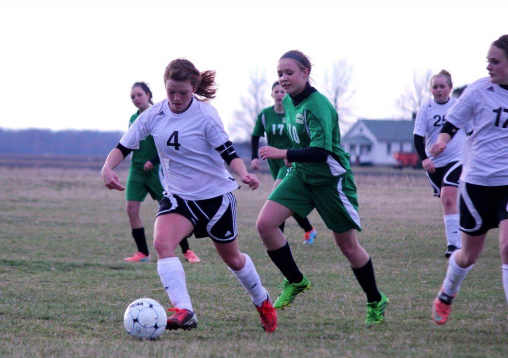 Ashlynn Jackson dribbles the ball down the field in the girls' soccer game this week against versus Piasa. 