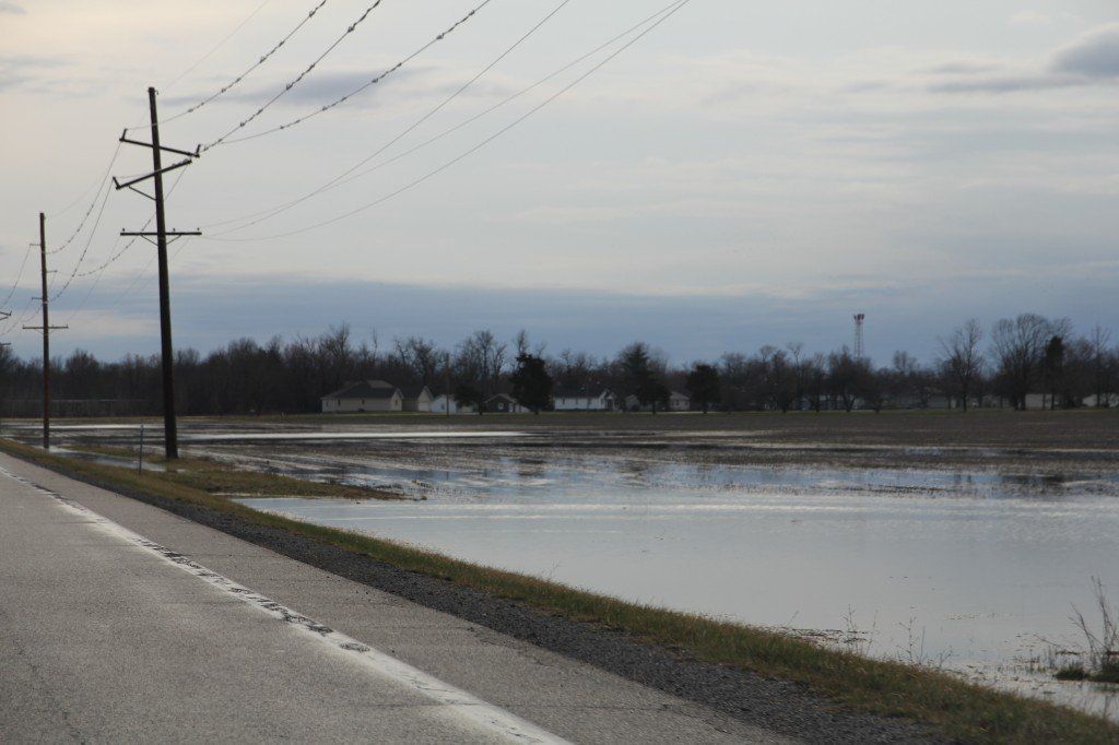 Water fills the fields on the east side of Gillespie this week after flash flood warnings echoed the BenGil area.