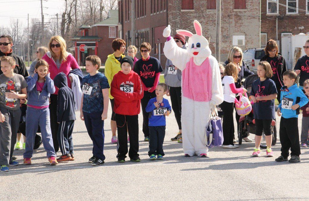 The Easter Bunny, along with other kids and adults, take their mark for the 1-mile fun run. 