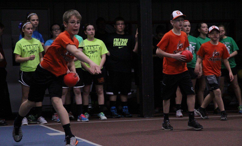 The Gillespie Sting team riffles dodge balls across the court in the dodgeball tournament held at Ageless on April 5. 