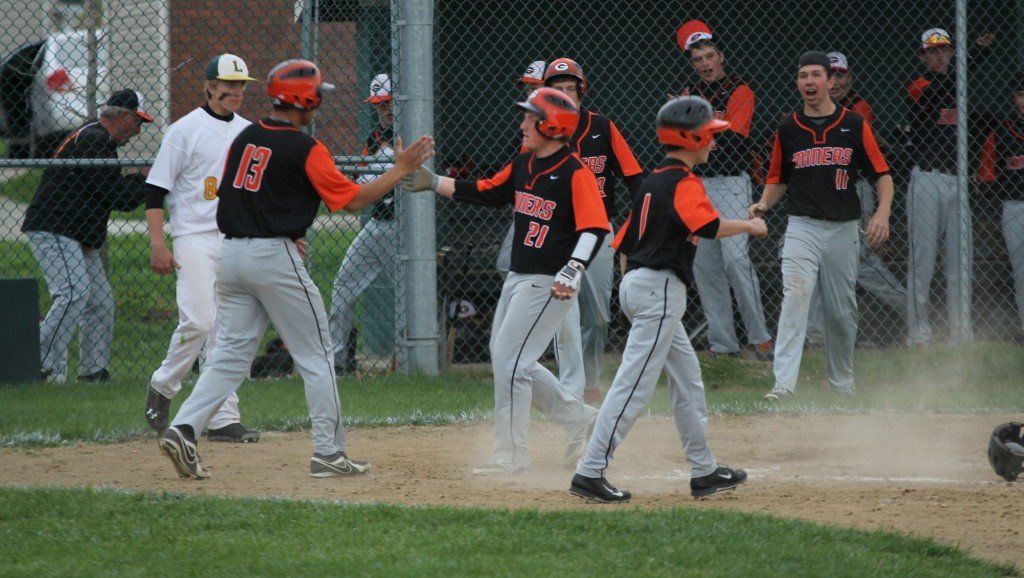 The Gillespie baseball team welcomes another run as they came from behind and beat Metro East Lutheran 9-5.