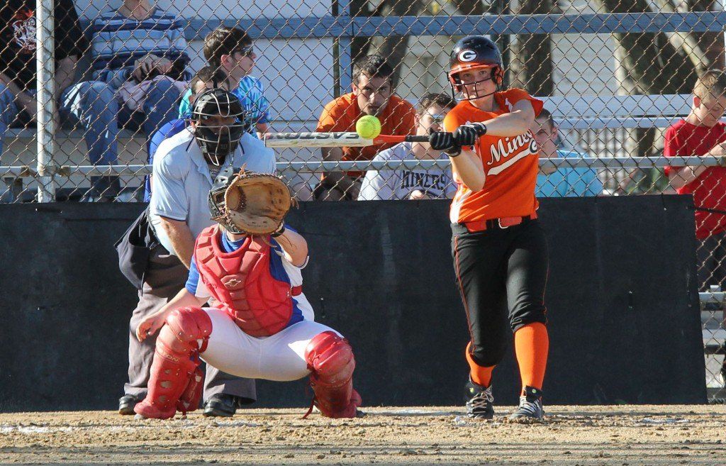Abby Bires extends to drive the softball out of the infield in Gillespie's 8-4 win over Roxana this week. 
