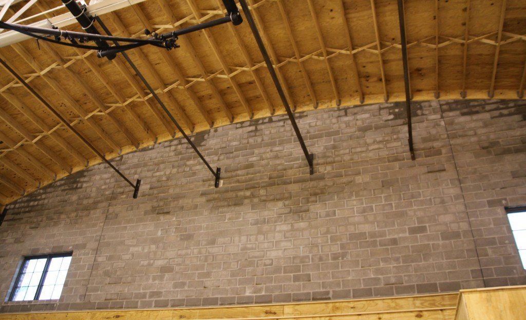 The new north wall stands tall and strong with the roof replicating exactly how the previous roof was built. 