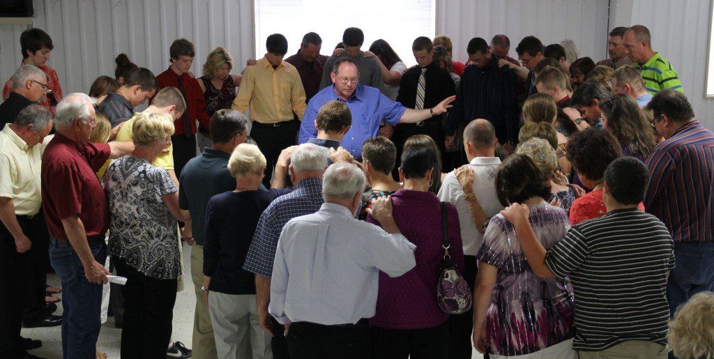 Pastor Steve Friese prays over the graduates and guests during the conclusion of the GHS Baccalaureate. 