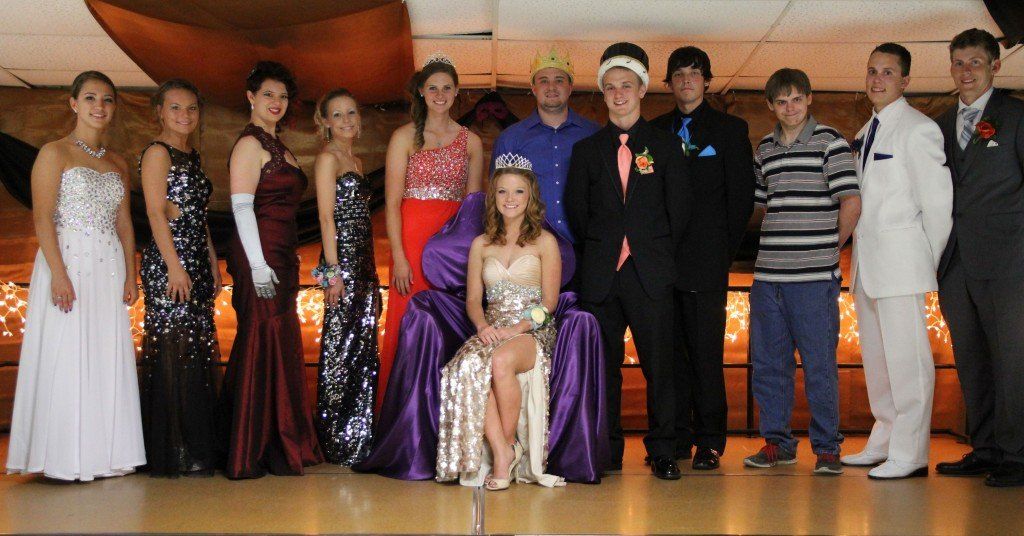 The 2014 Prom Court pose on stage with King and Queen Eric Lancaster and Ashlynn Jackson. 