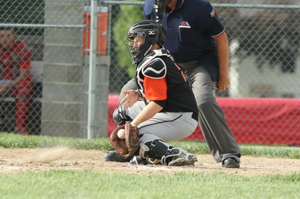Eli Fox blocks a pitch thrown in the dirt to save a run in Gillespie's win over Staunton.