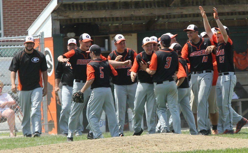 The Miners celebrate with each other after shutting out Carlinville on Saturday afternoon and clinching the regional. 