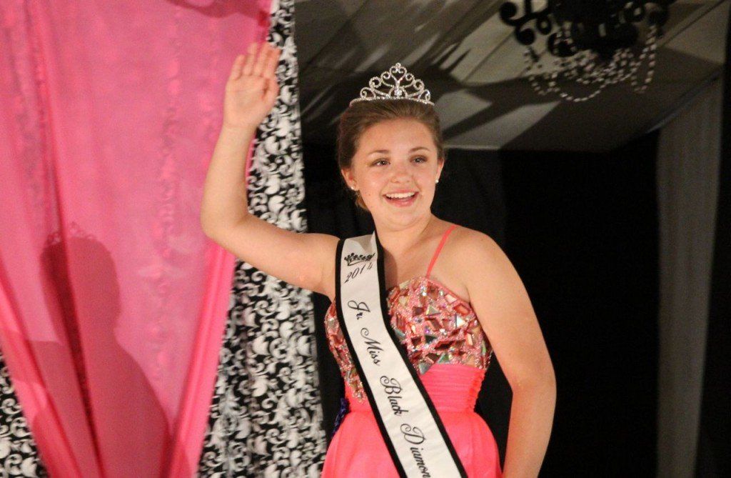 Grace Martin takes her first walk on stage after being named 2014 Jr. Miss Black Diamond Days. 